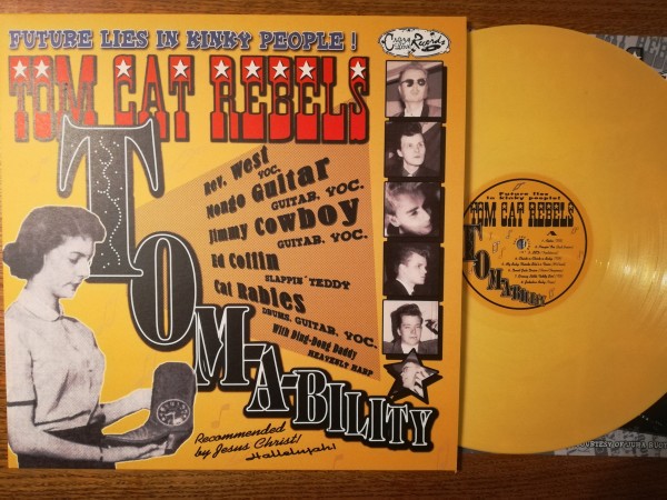 TOM CAT REBELS - Tom-A-Bility LP ltd. yellow